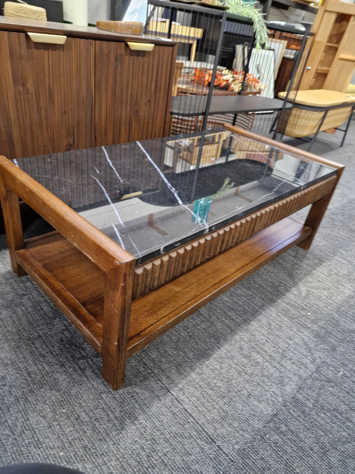 Dark wood and black marble coffee table with storage
