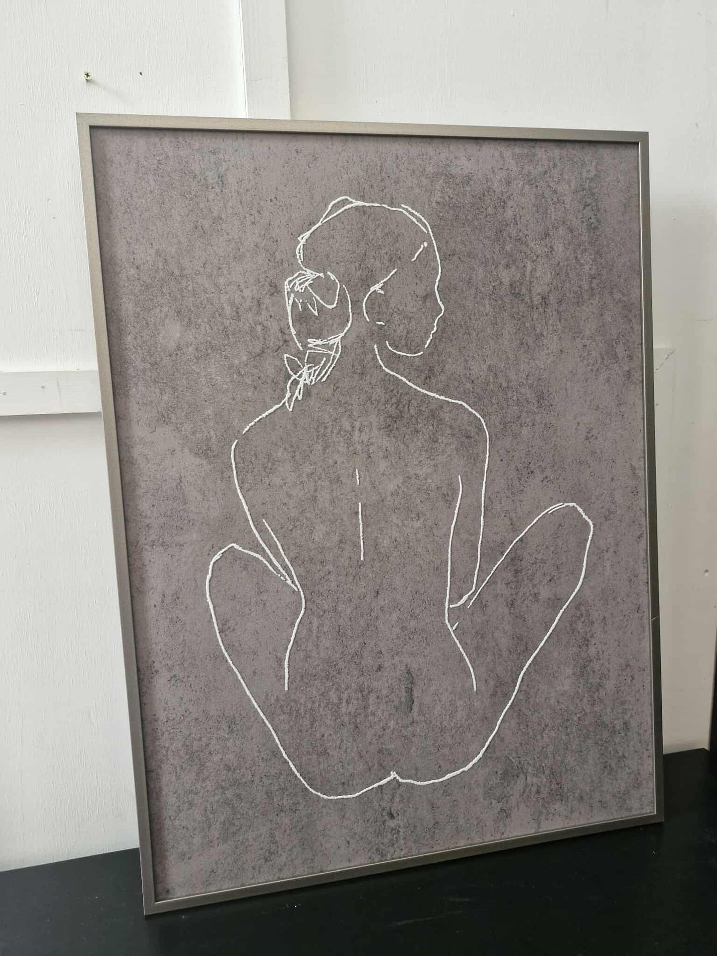 Brown and white framed canvas