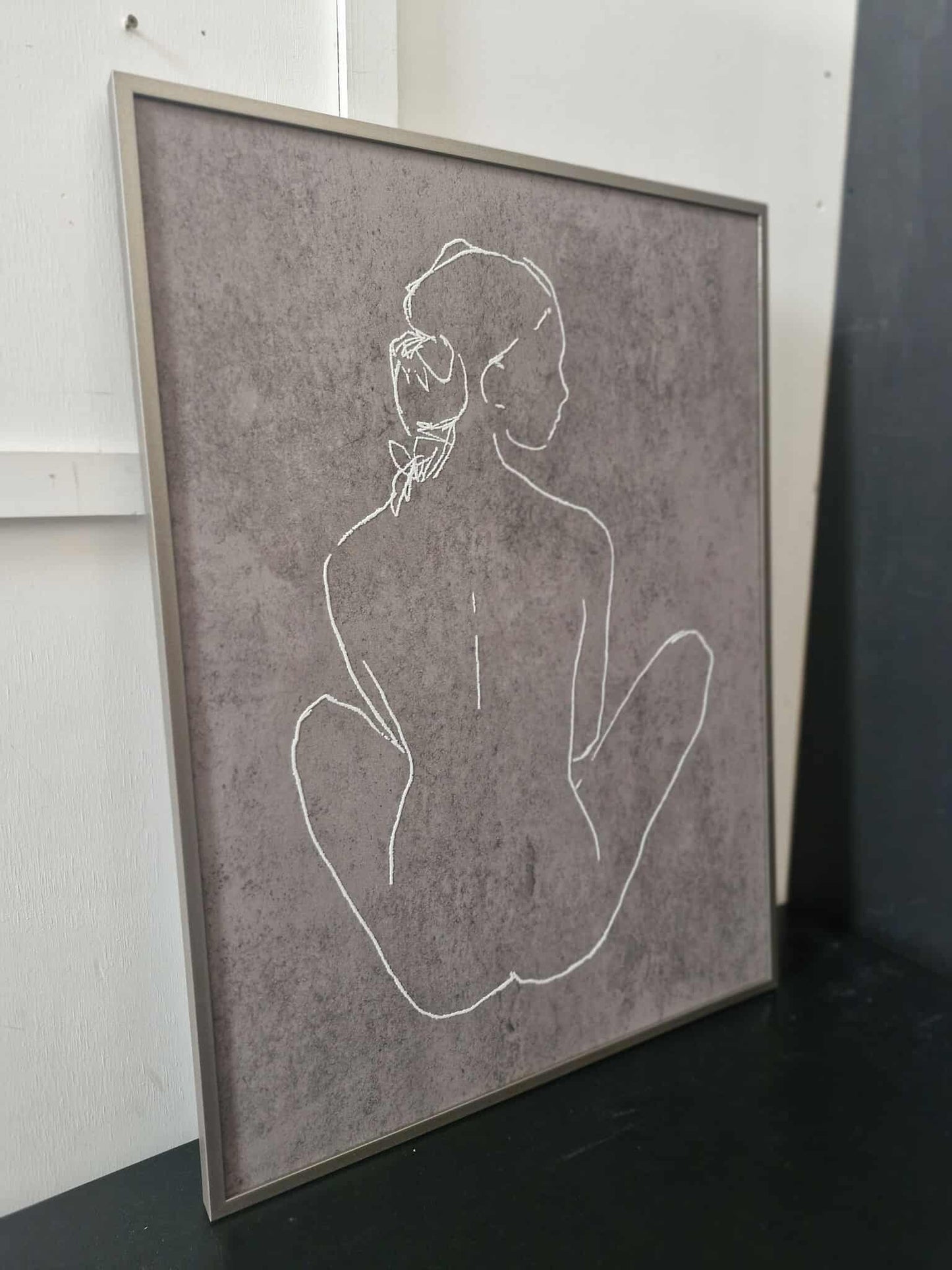 Brown and white framed canvas