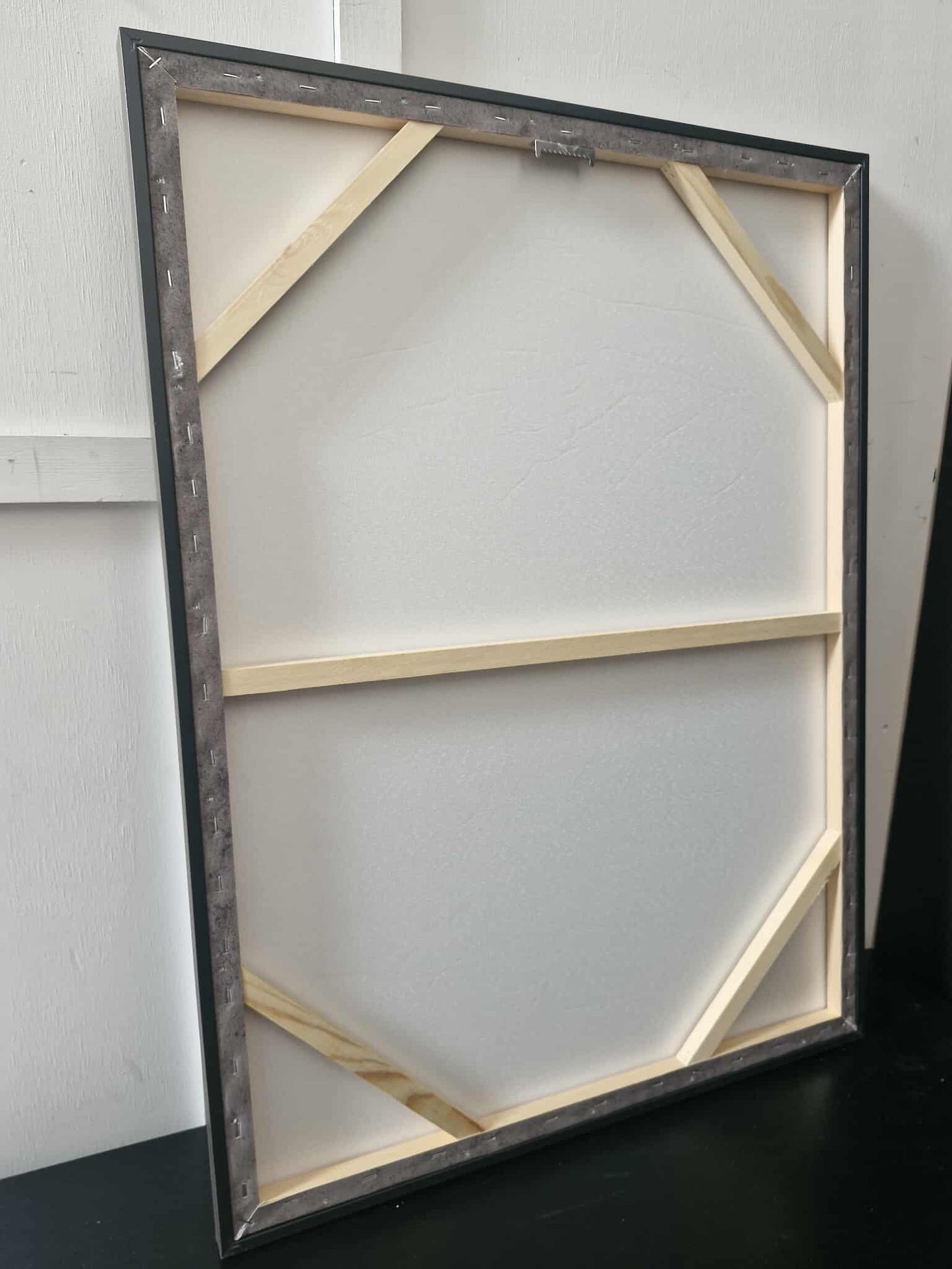 Brown and white framed canvas