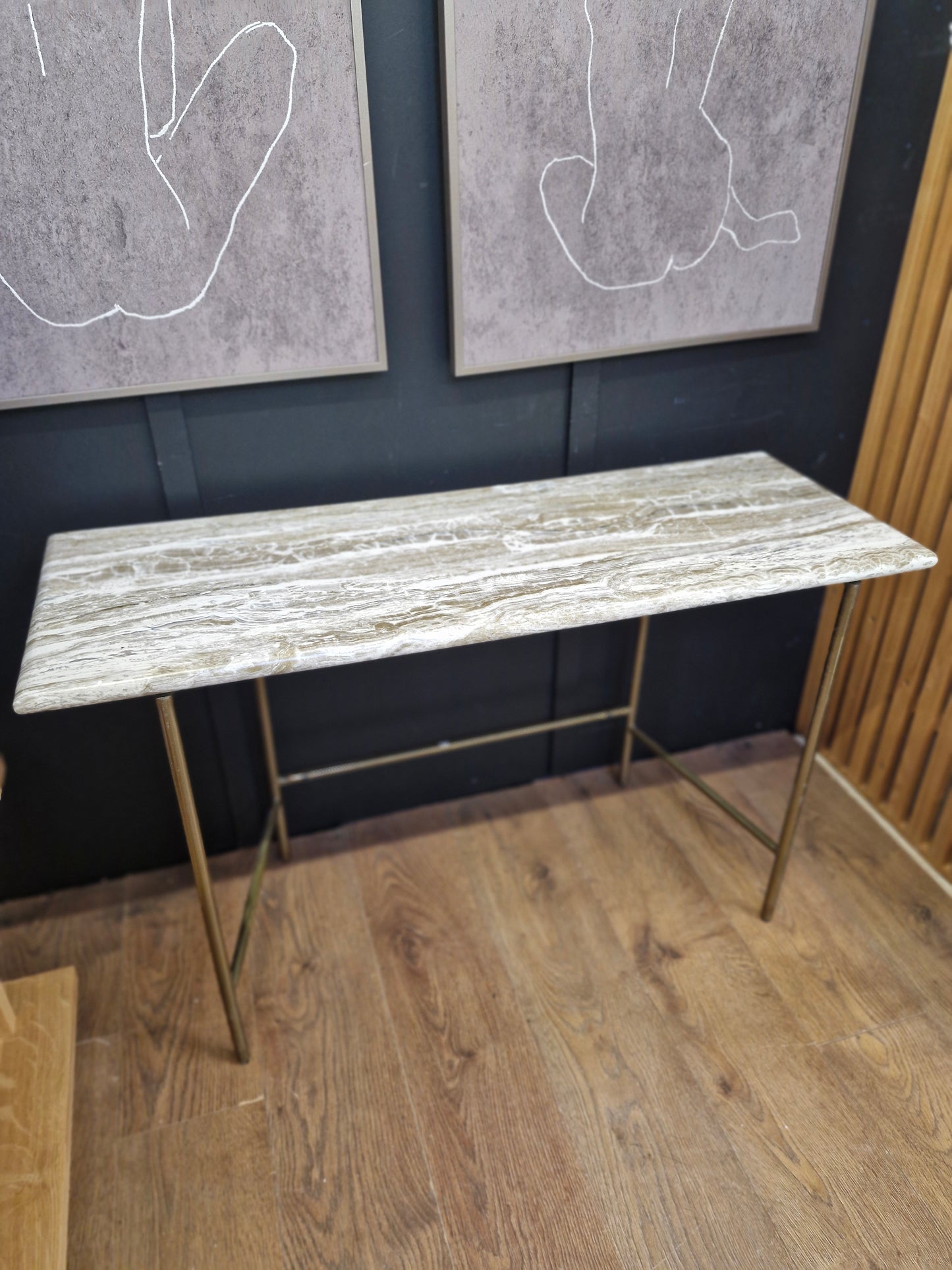 Marble effect console table with brass legs