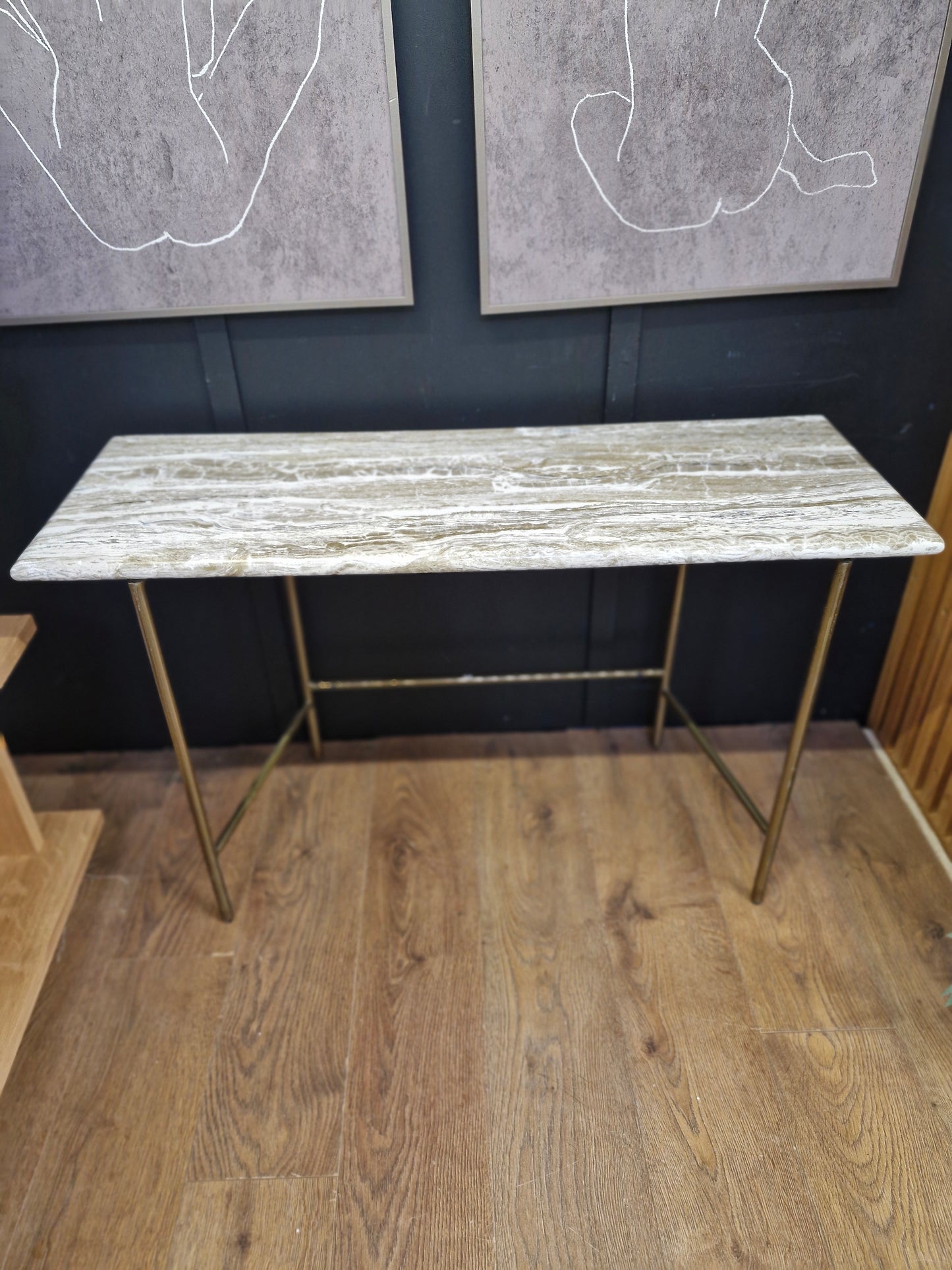 Marble effect console table with brass legs