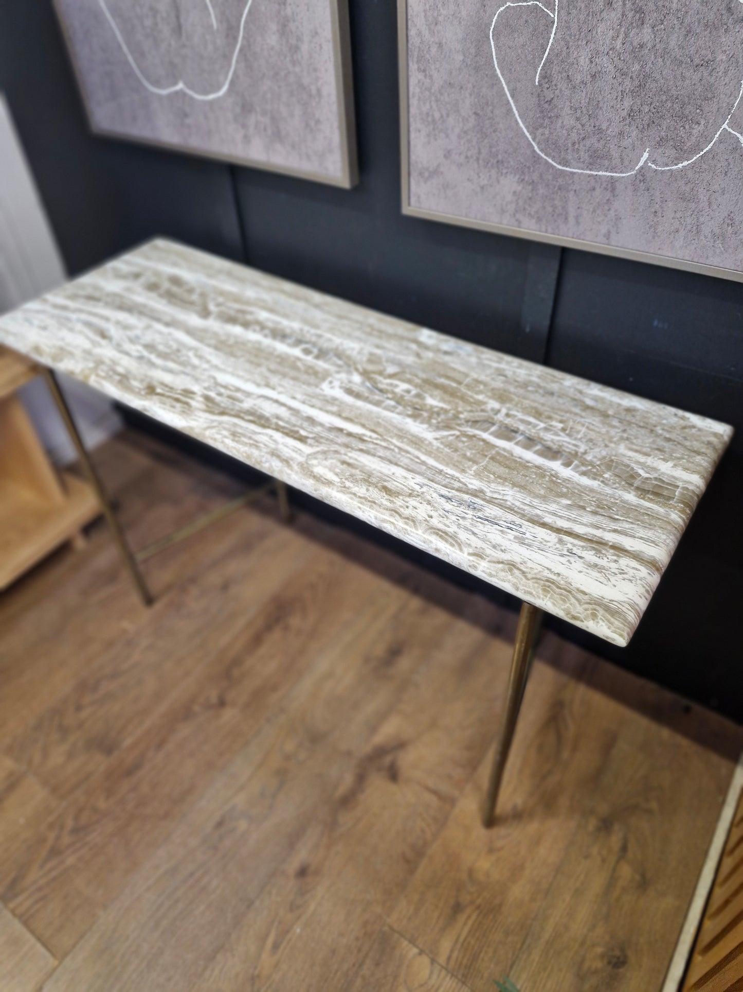 Marble effect console table with brass legs