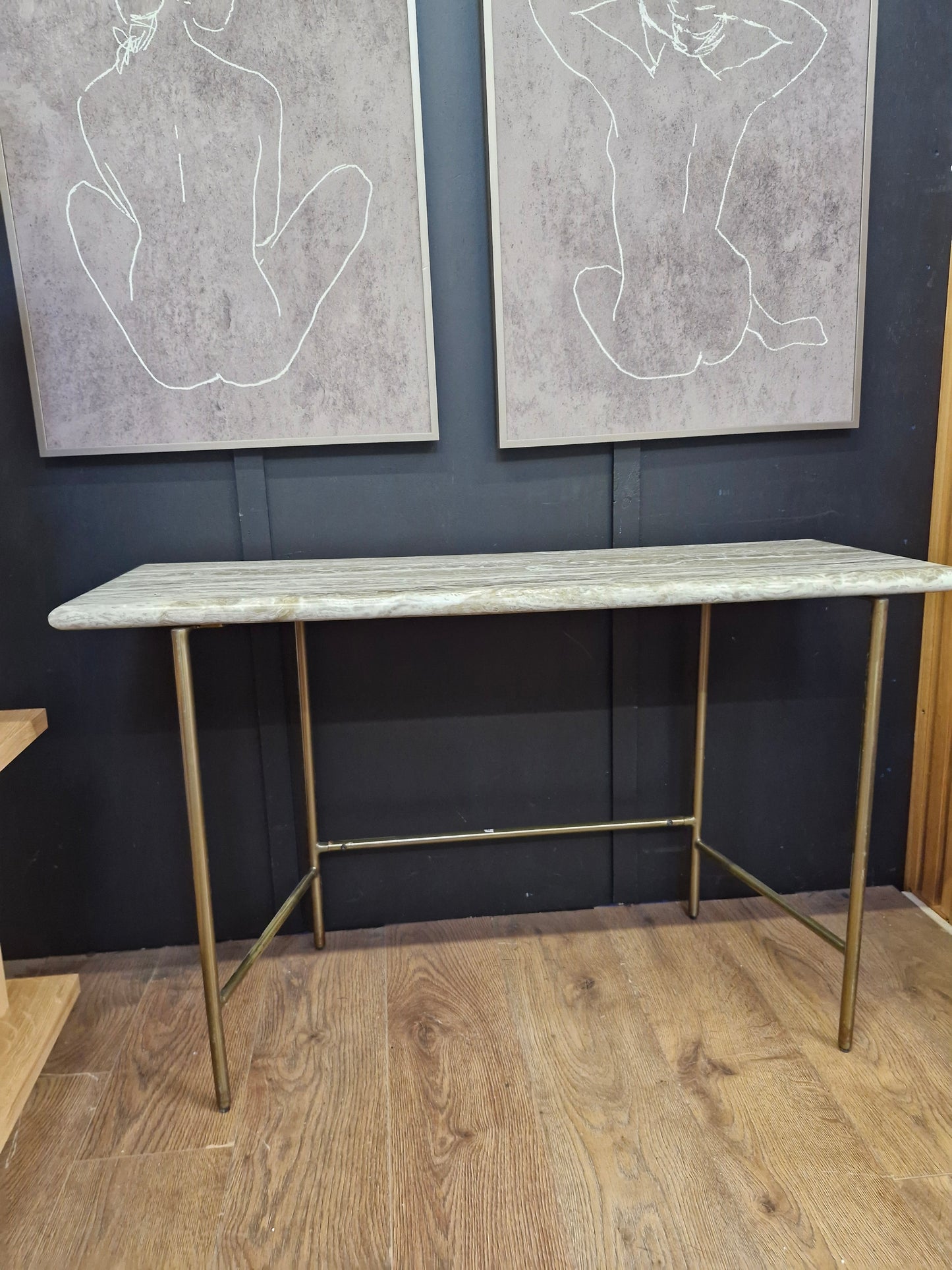 Marble effect console table with brass legs