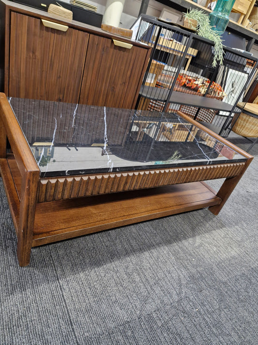 Dark wood and black marble coffee table with storage