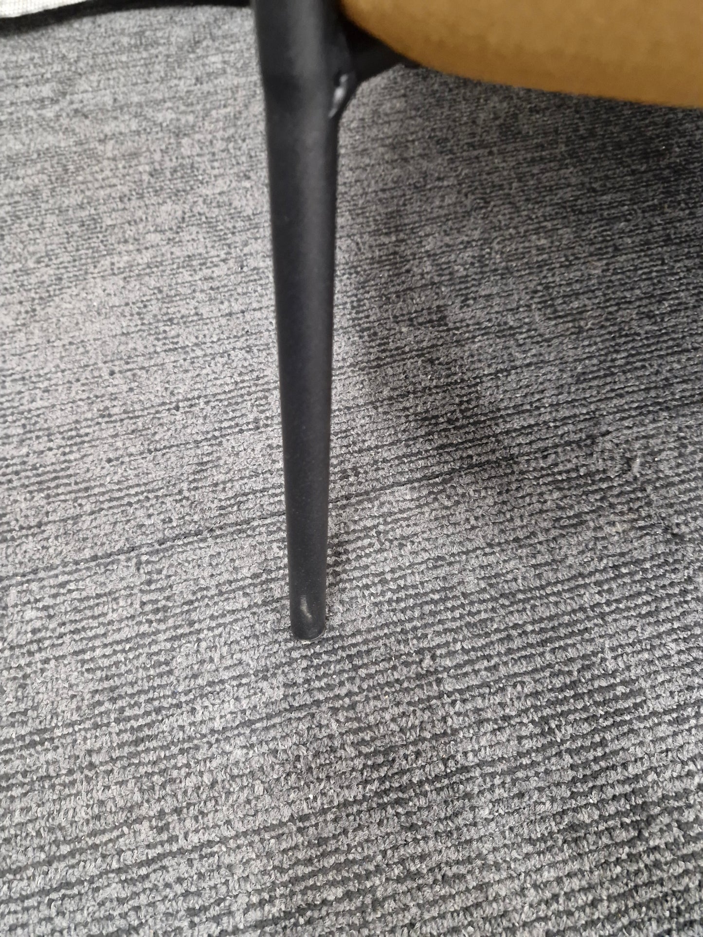 Mustard velvet armchair and black metal legs