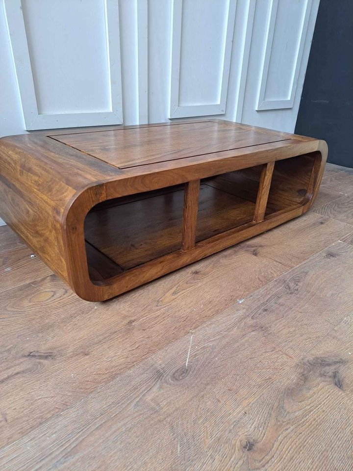 Solid wood coffee table with storage curved