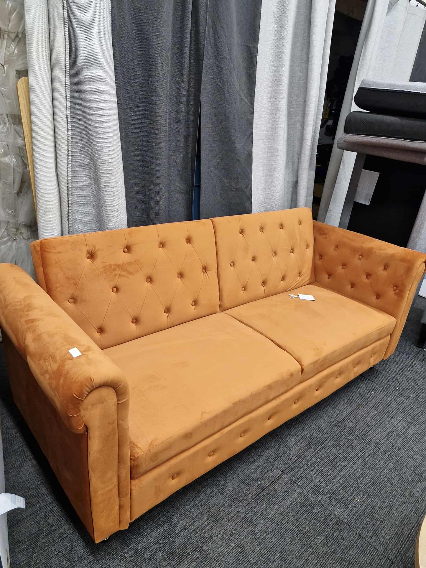 3 SEATER CHESTERFIELD STYLE VELVET SOFA BED IN ORANGE