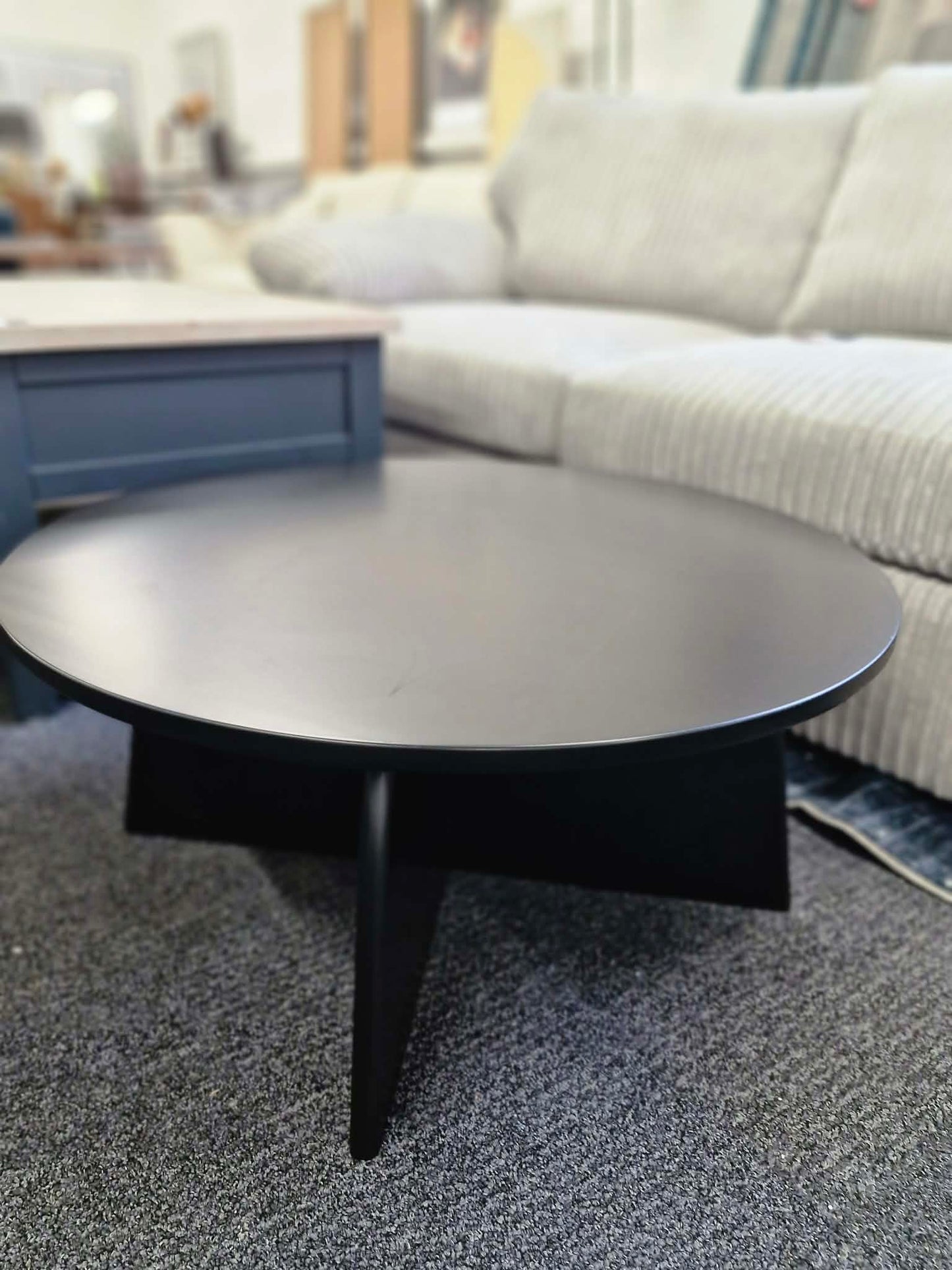 Black Round Coffee Table with Curved Base