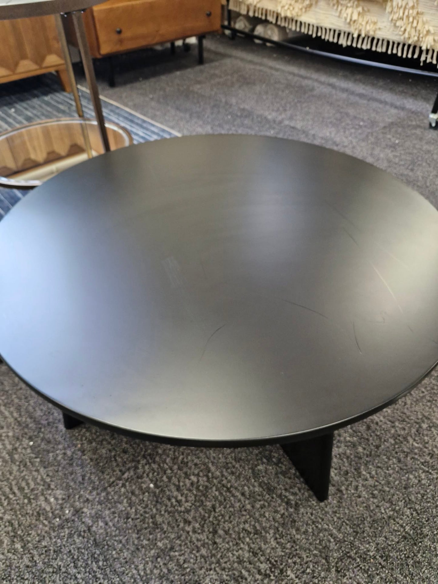 Black Round Coffee Table with Curved Base