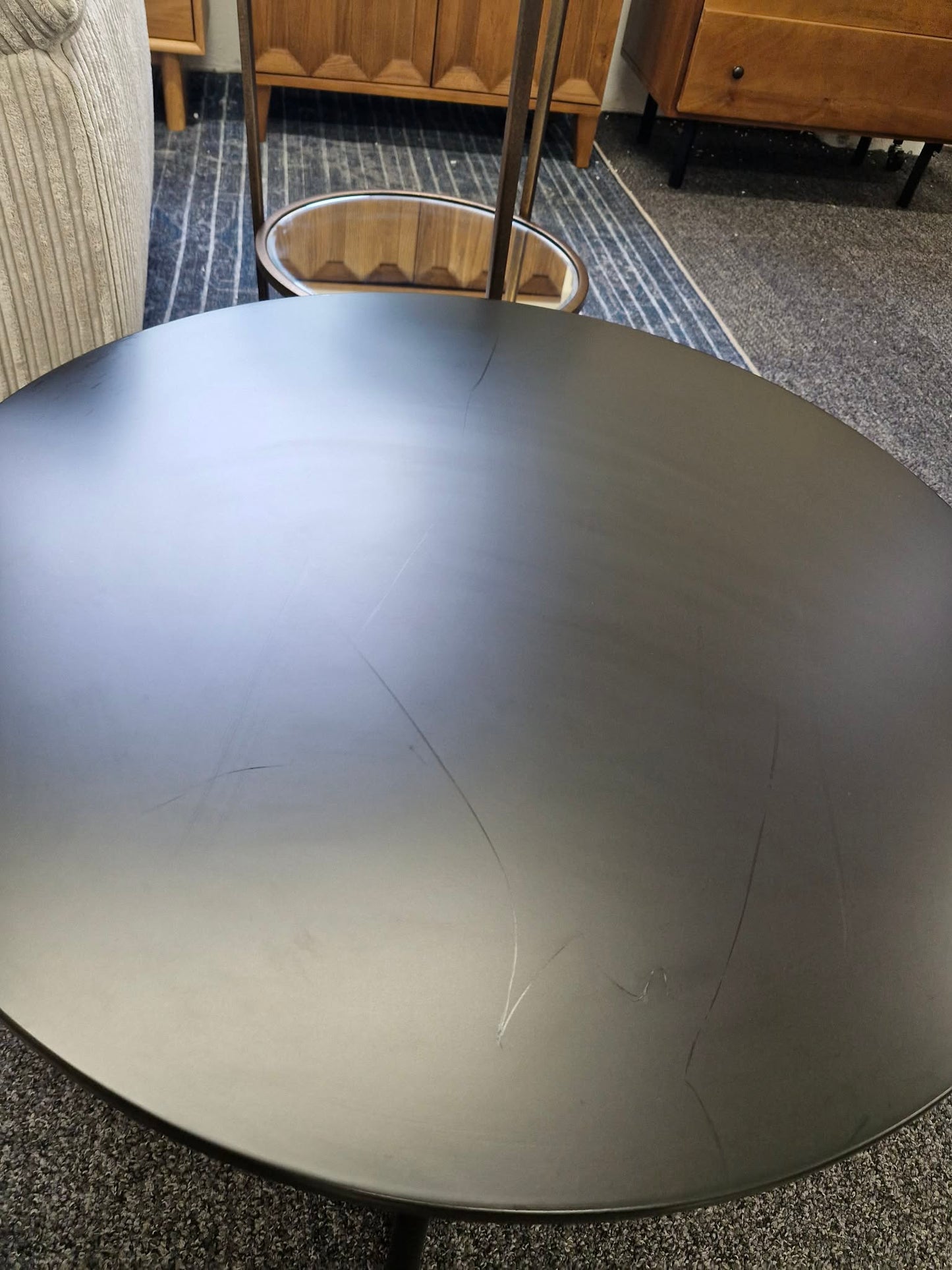 Black Round Coffee Table with Curved Base
