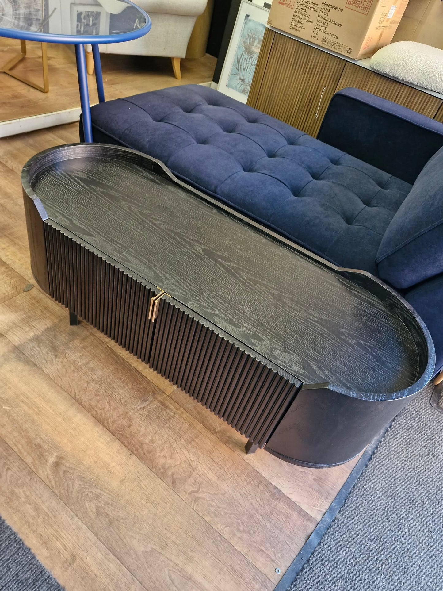 Black Oval Tv Stand Unit with ribbed front