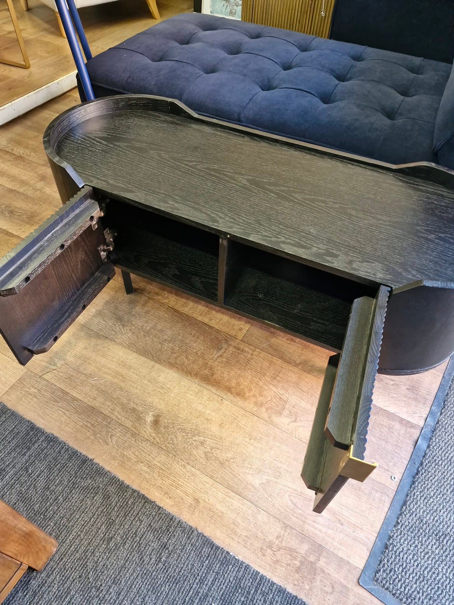 Black Oval Tv Stand Unit with ribbed front