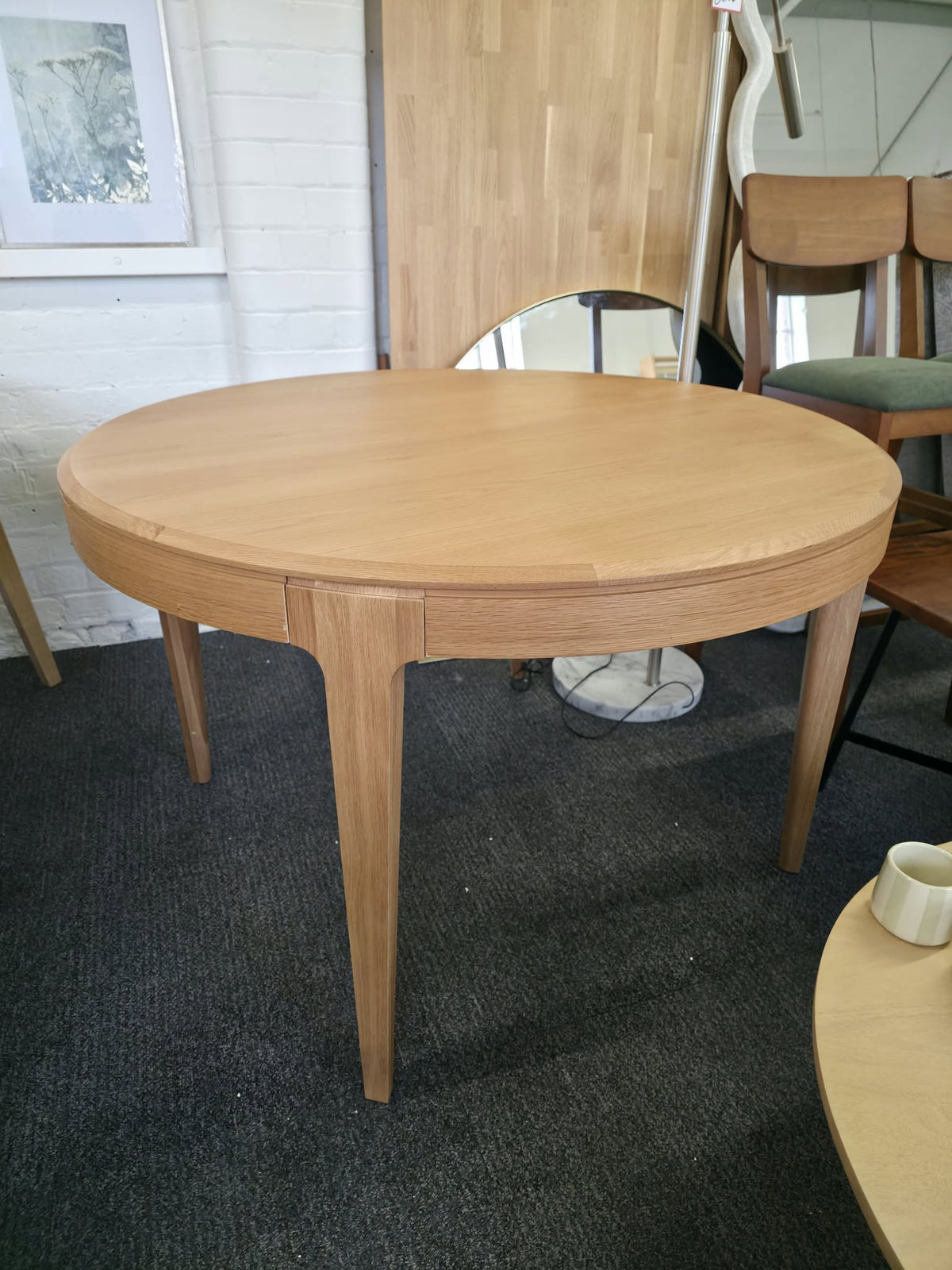 Round Extendable Oak Dining Table - Seats 4 to 8