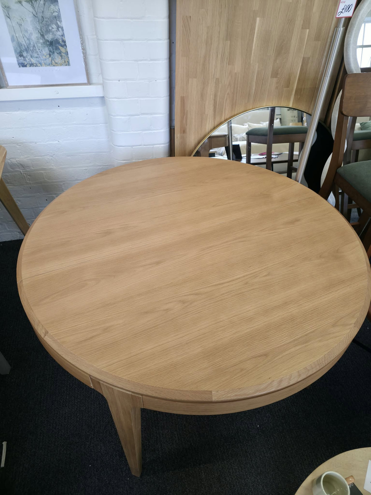 Round Extendable Oak Dining Table - Seats 4 to 8