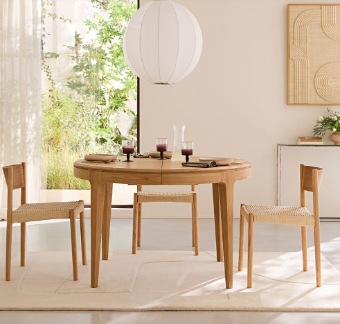 Round Extendable Oak Dining Table - Seats 4 to 8